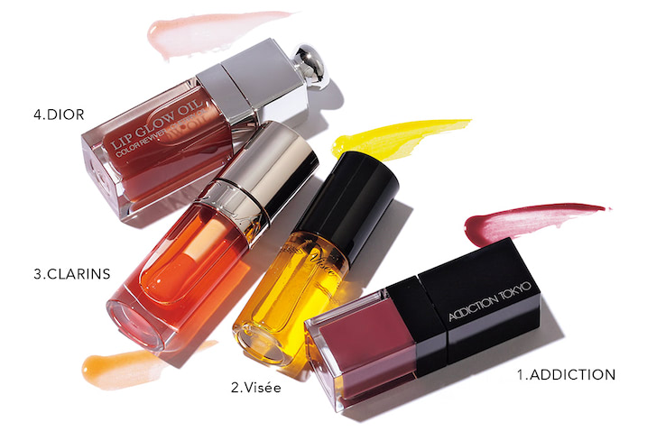 ☑みずみずしく透けるリップ②： ●03/CLARINS　リップコンフォートオイル 05 3,850円／クラランス　65年以上も美容オイルの研究を続けるクラランスの看板リップがリニューアル。新しくなったリッチなうるおい成分が、唇にやさしくフィットして長時間保湿。全8色。  ●04/DIOR　ディオール アディクト リップ グロウ オイル 030（5月6日数量限定）4,290円／パルファン・クリスチャン・ディオール　濃密なケア成分を配合した既存6色に加え、夏の日差しに映えるブロンズカラーがお目見え。